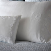 Silk Collection mini pillows in white with floral vine embroidery and monogram