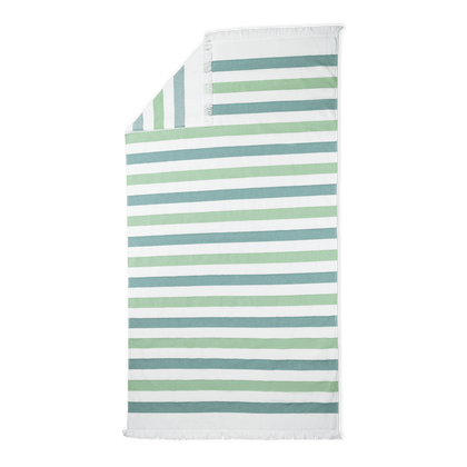 Amado beach towel in the Palm Stripe colorway.