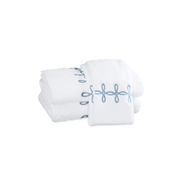 Hazy blue Gordian Knot towels.