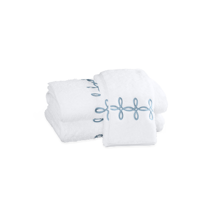 Hazy blue Gordian Knot towels.