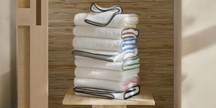 Whipstitch white towels with crochet-trim edges in assorted colors