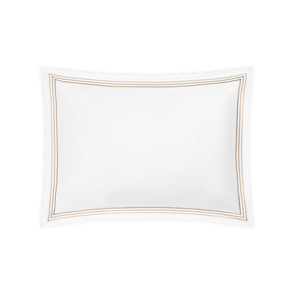 White Amara Triple Pearl sham with tan embroidered trim.