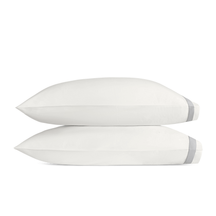 Off-white and silver Ambrose pillowcase, folded.