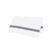 Deep blue Astor Braid flat sheet, folded.