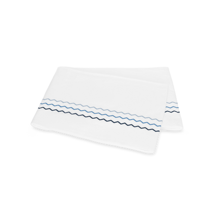 Azure blue Axel flat sheet, folded.