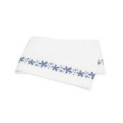 Pale blue Callista flat sheet, folded.