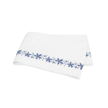 Pale blue Callista flat sheet, folded.