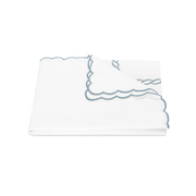 Hazy blue Classic Chain Scallop duvet cover, folded.