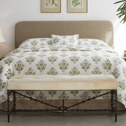 Dalila pebble floral duvet cover styled on a bed