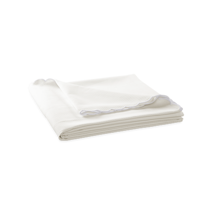 Off-white Diamond Pique coverlet.
