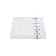 Medium blue Gordian Knot duvet cover, folded.