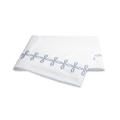 Medium blue Gordian Knot flat sheet, folded.