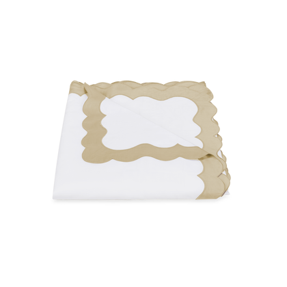 Gold Lorelei duvet cover, folded.