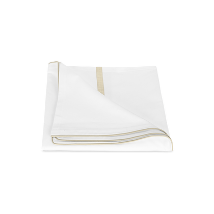 Tan Louise Pique duvet cover, folded.