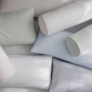 Matteo striped bolster and lumbar pillows in pastel colors arranged together