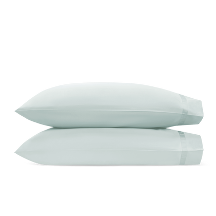 Pale blue-gray Nocturne pillowcase, folded.