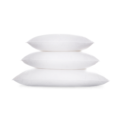 White Chalet pillows, stacked.