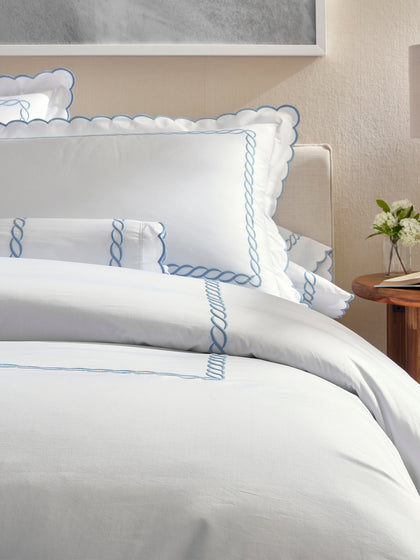 Classic Chain bed collection scalloped white bedding with light blue chain-stitch trim