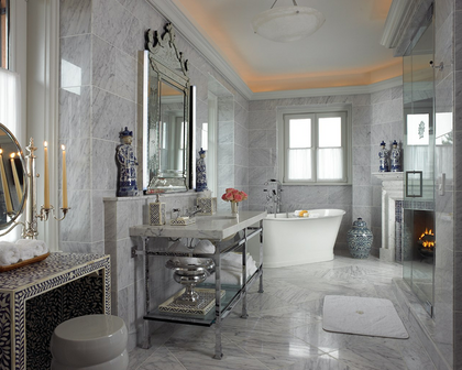 Glenmere Mansion in Chester, NY: Carrara marble bathroom with freestanding tub, fireplace and blue-and-white porcelain