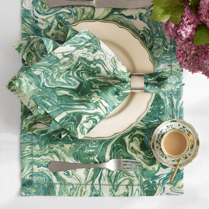 Balthazar green marbleized placemat and napkin set at a place setting