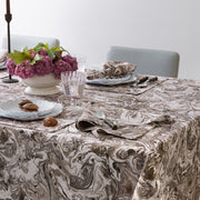 Balthazar grey and brown marbleized tablecloth styled on a dining table