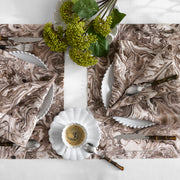 Balthazar brown marbled napkins and table runner styled with place settings.