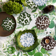 Round Iconic Leopard cocktail napkins in green, blue, and brown