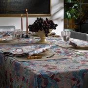 Magic Mountain print tablecloth and napkins styled on a dining table