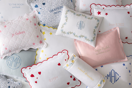 Assorted personalized mini pillows.