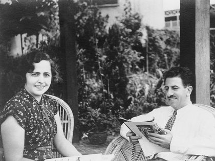 Matouk's founders seated together in a vintage black-and-white photograph
