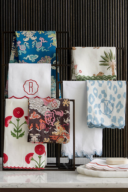 Schumacher guest towels, two embroidered with monogram letters.