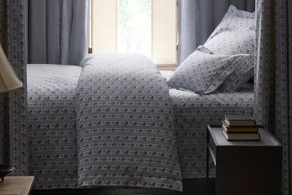 Cabanon Stripe bedding styled on a bed.