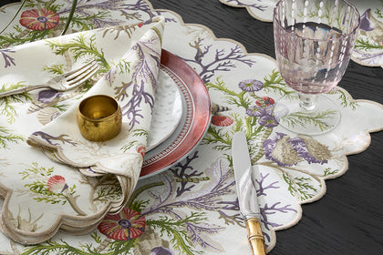Del Tesoro table linens with a coral-reef motif.