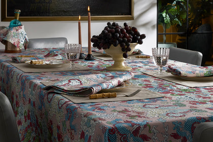 Magic Mountain patterned tablecloth set for a dinner party.