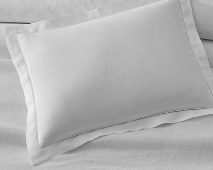 White Roman Linen pillow sham with a hemstitch trim.