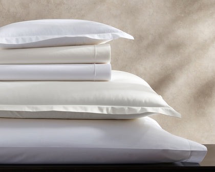 Ceylon sheets and pillow, stacked.