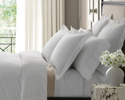 White Gatsby sheeting with a ruffled edge, close-up.