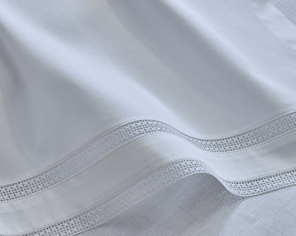 White Talita linen sheeting with a hemstitch trim, close-up.