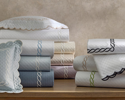 Classic Chain matelassé shams and sheets with chain-embroidery trim in multiple colors