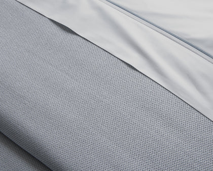 Gray Costa Mesa textured blanket edge.
