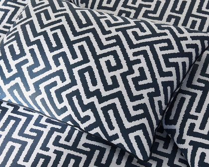 Navy and white Gabriel fretwork print pillows.