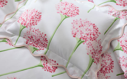 Pink Charlotte allium-print quilted bedding.