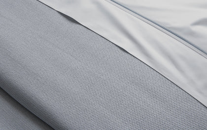 Gray Costa Mesa textured blanket edge.