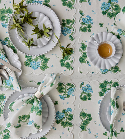 Geranium table linens, set overhead.
